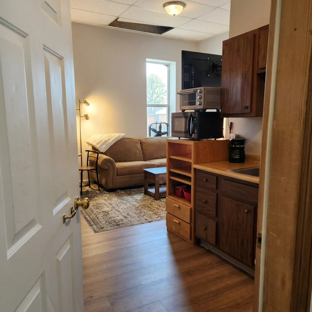 View into the suite past the kitchenette